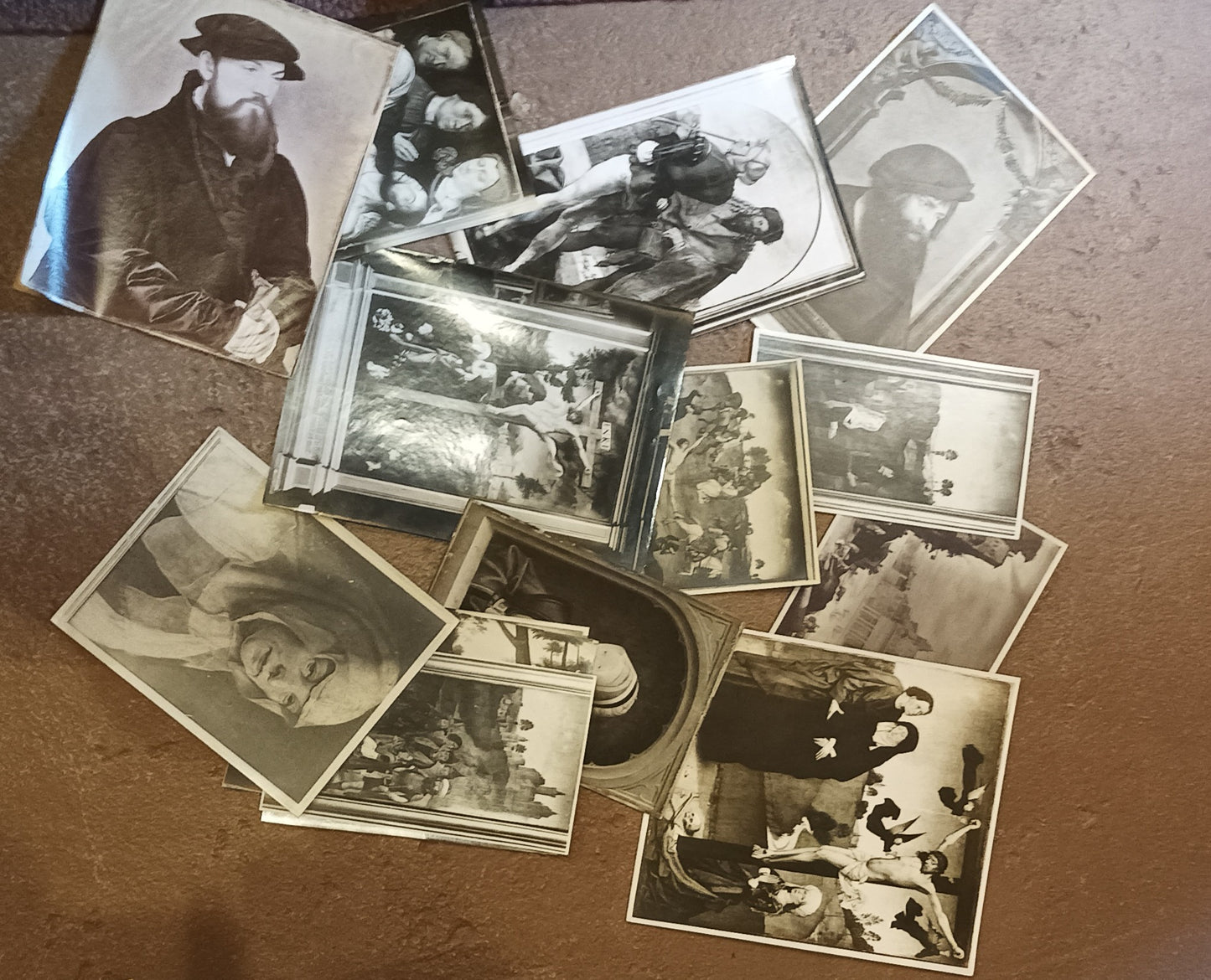 [Renaissance. Photography]. Album with ca. 60 mounted  photographic reproductions of mainly Renaissance artists from Rome and Firenze museums